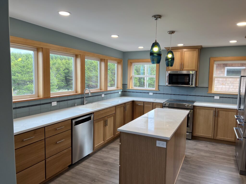 Full-Scale remodel featuring new cabinets, countertops, tile and appliance