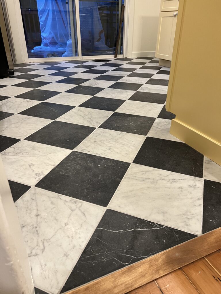 New floors in kitchen remodel. Harlequin marble tile 