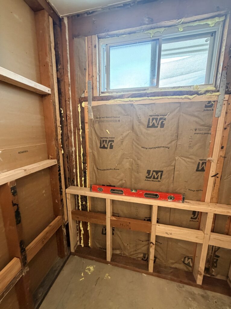 Framing corrections and insulation added to a bathroom remodel