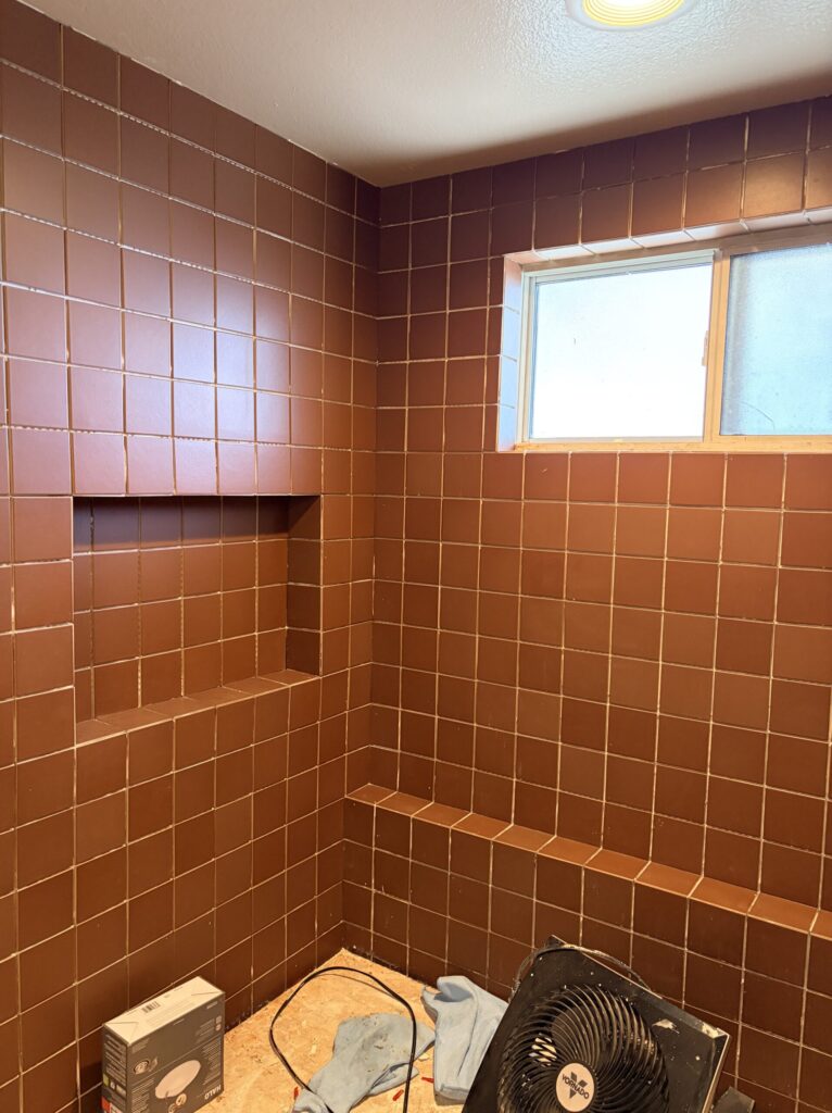 We protected the new tub as the tile install began